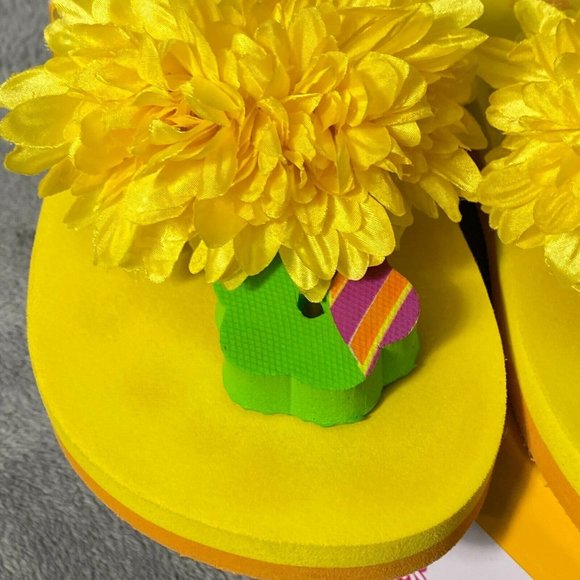yellow daisy flip flops